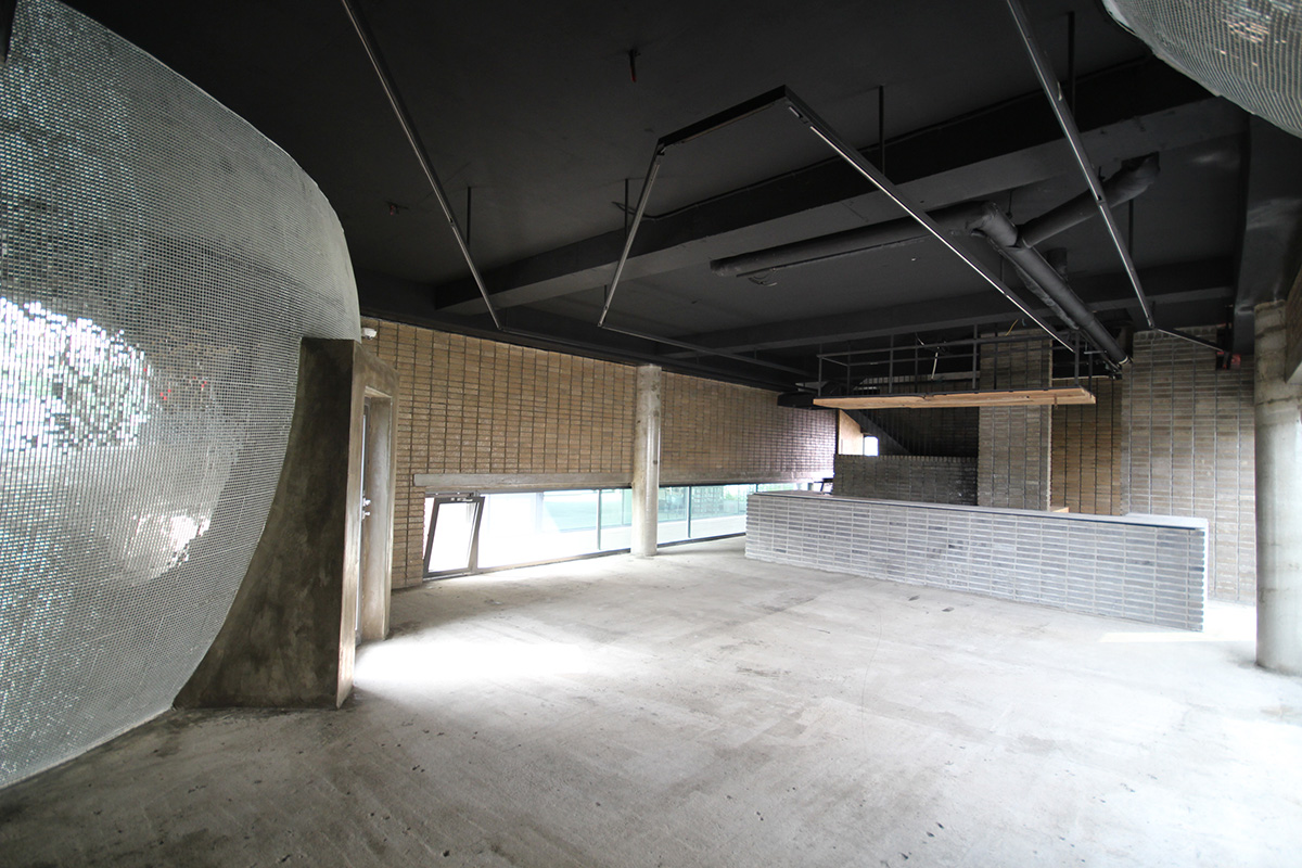 Moon Hoon Architects completed ’’Two Moon’’: a multi use building comprises two-segmented pieces