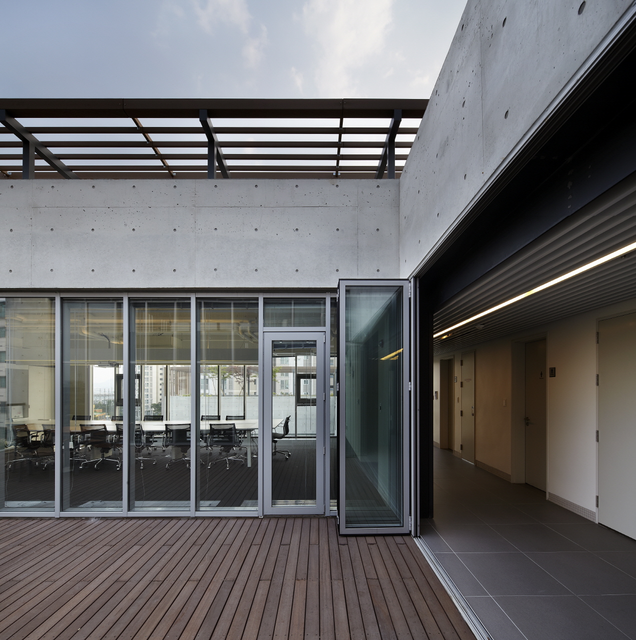 The Happiness Foundation shows elegancy of concrete in its own environment by The_System Lab