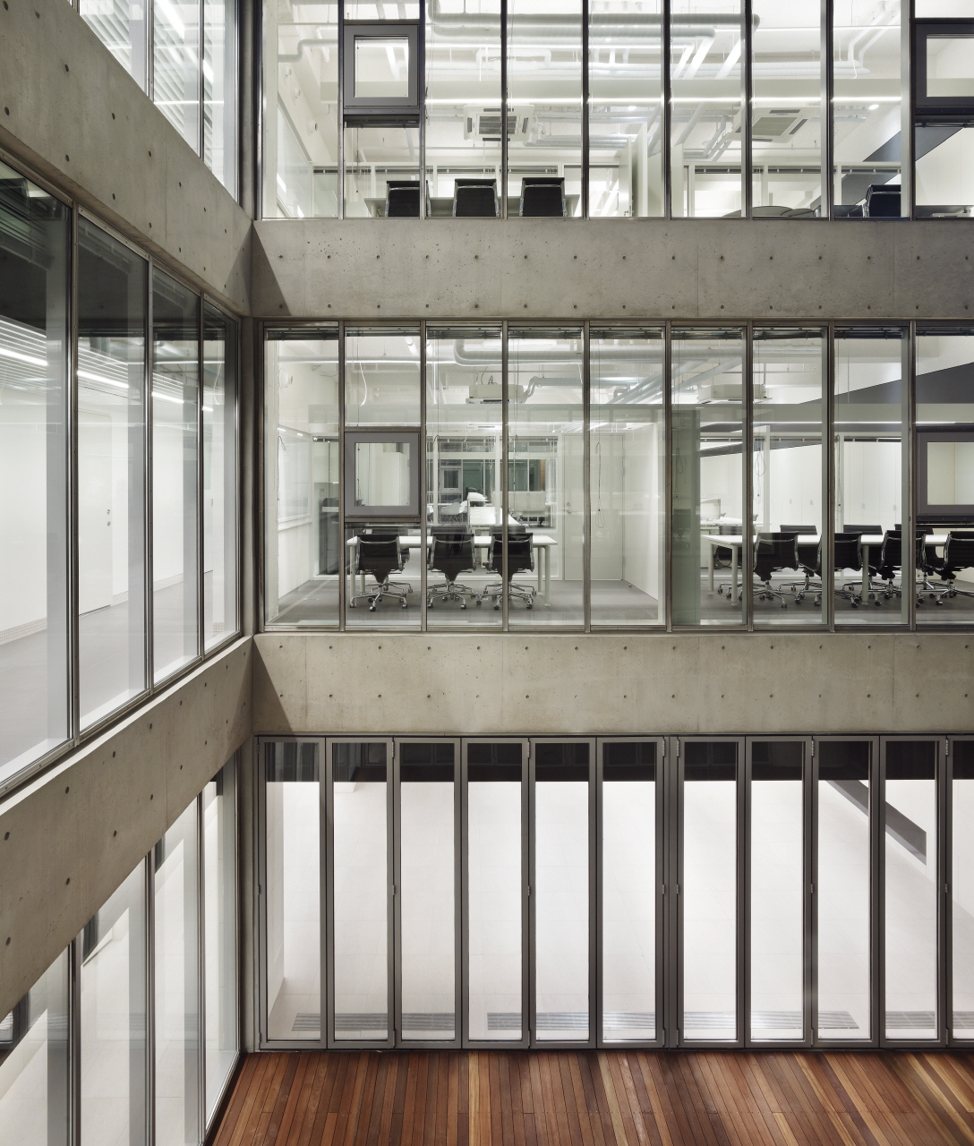 The Happiness Foundation shows elegancy of concrete in its own environment by The_System Lab