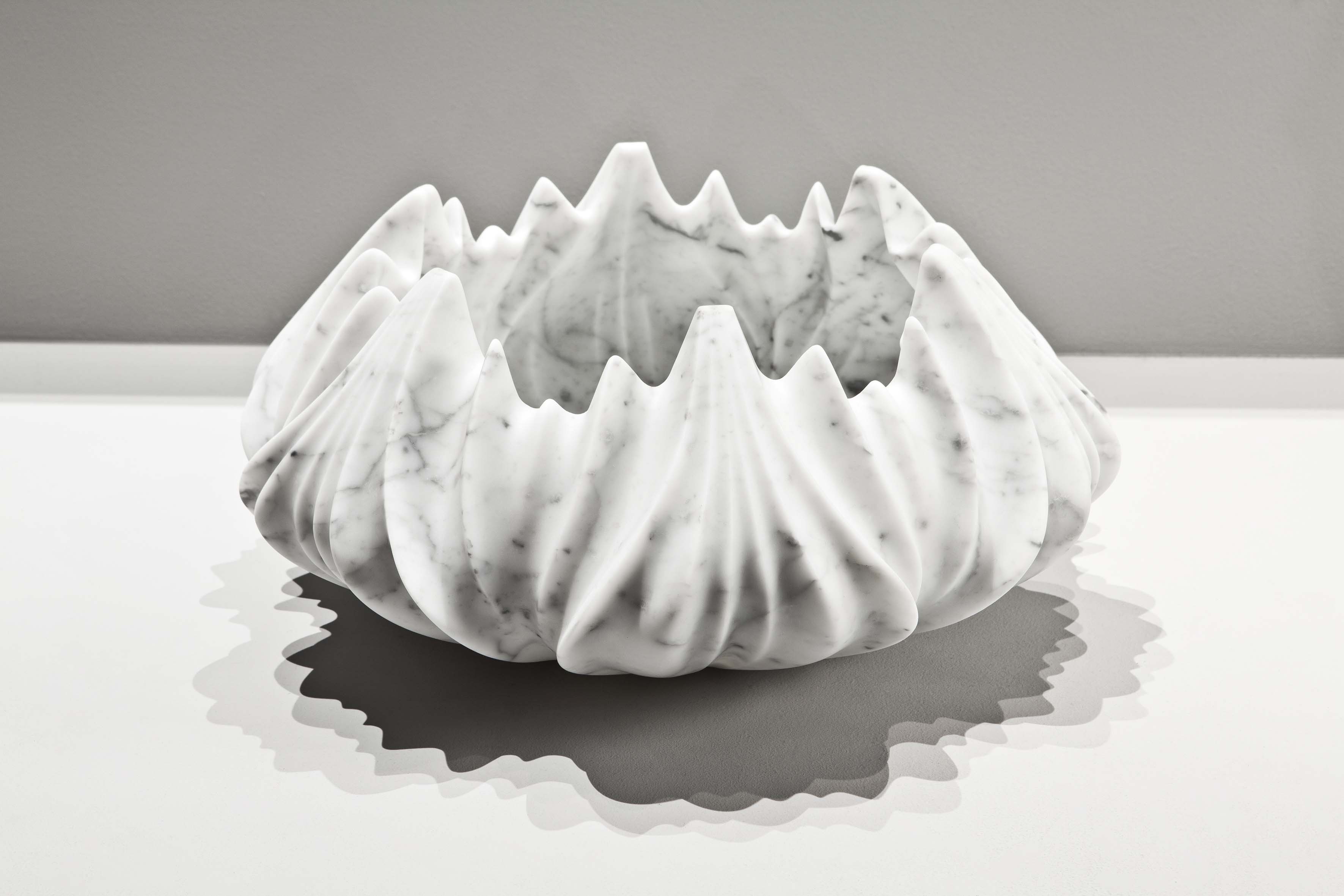 Tau Vases and Quad Tables for Citco Marbles by Zaha Hadid