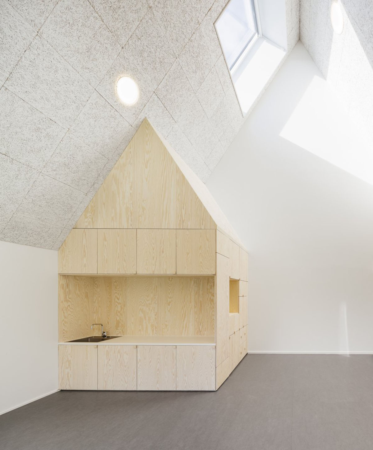 Frederiksvej Kindergarten is a warmly ’new playful village’ for children designed by COBE