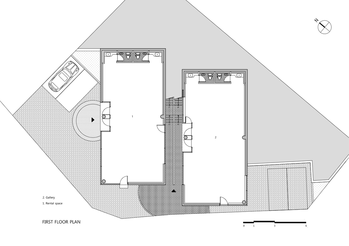 Moon Hoon Architects completed ’’Two Moon’’: a multi use building comprises two-segmented pieces