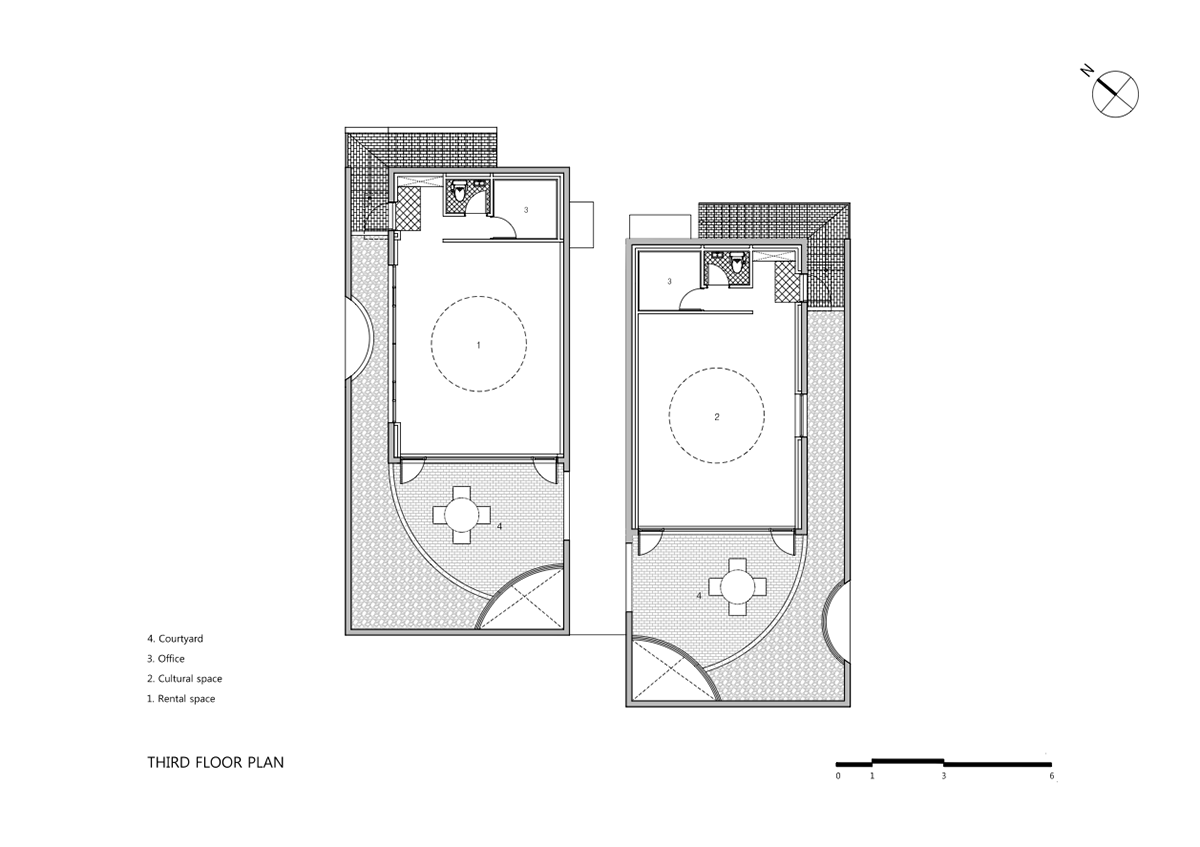 Moon Hoon Architects completed ’’Two Moon’’: a multi use building comprises two-segmented pieces