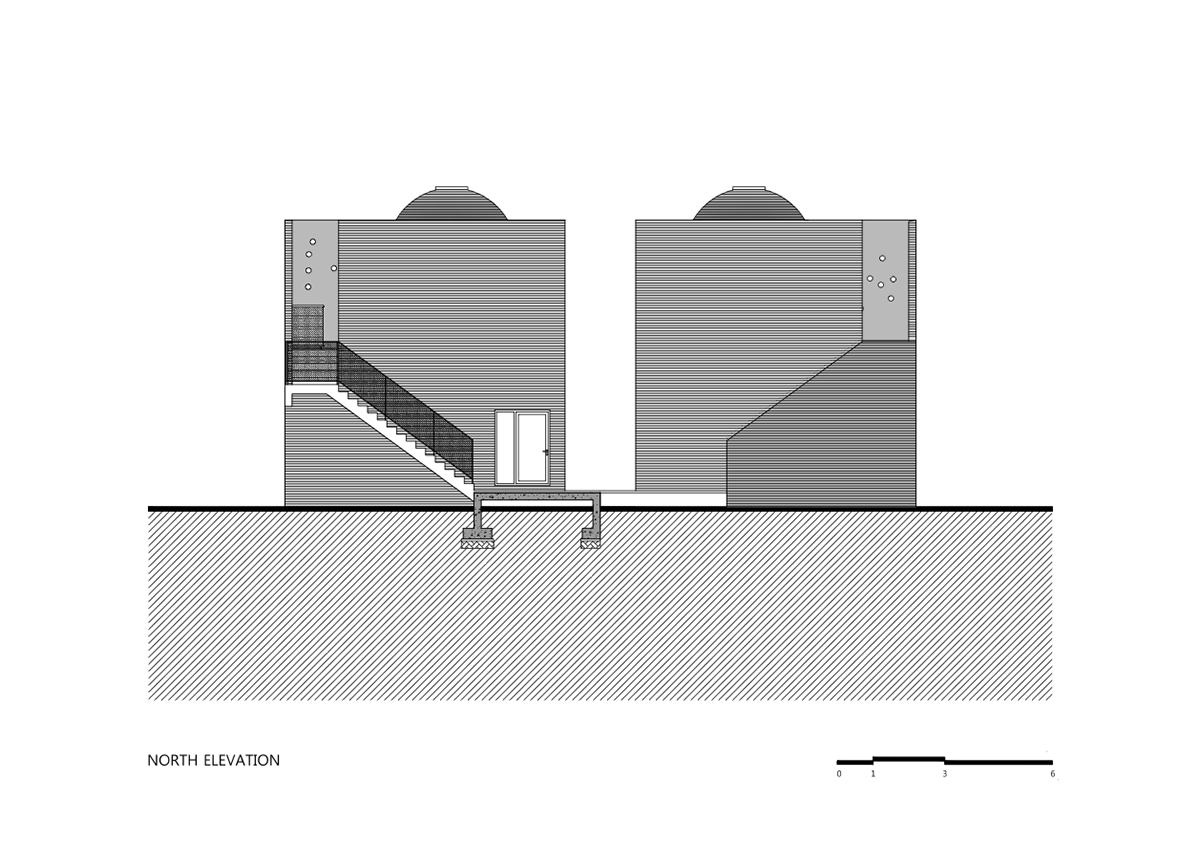 Moon Hoon Architects completed ’’Two Moon’’: a multi use building comprises two-segmented pieces