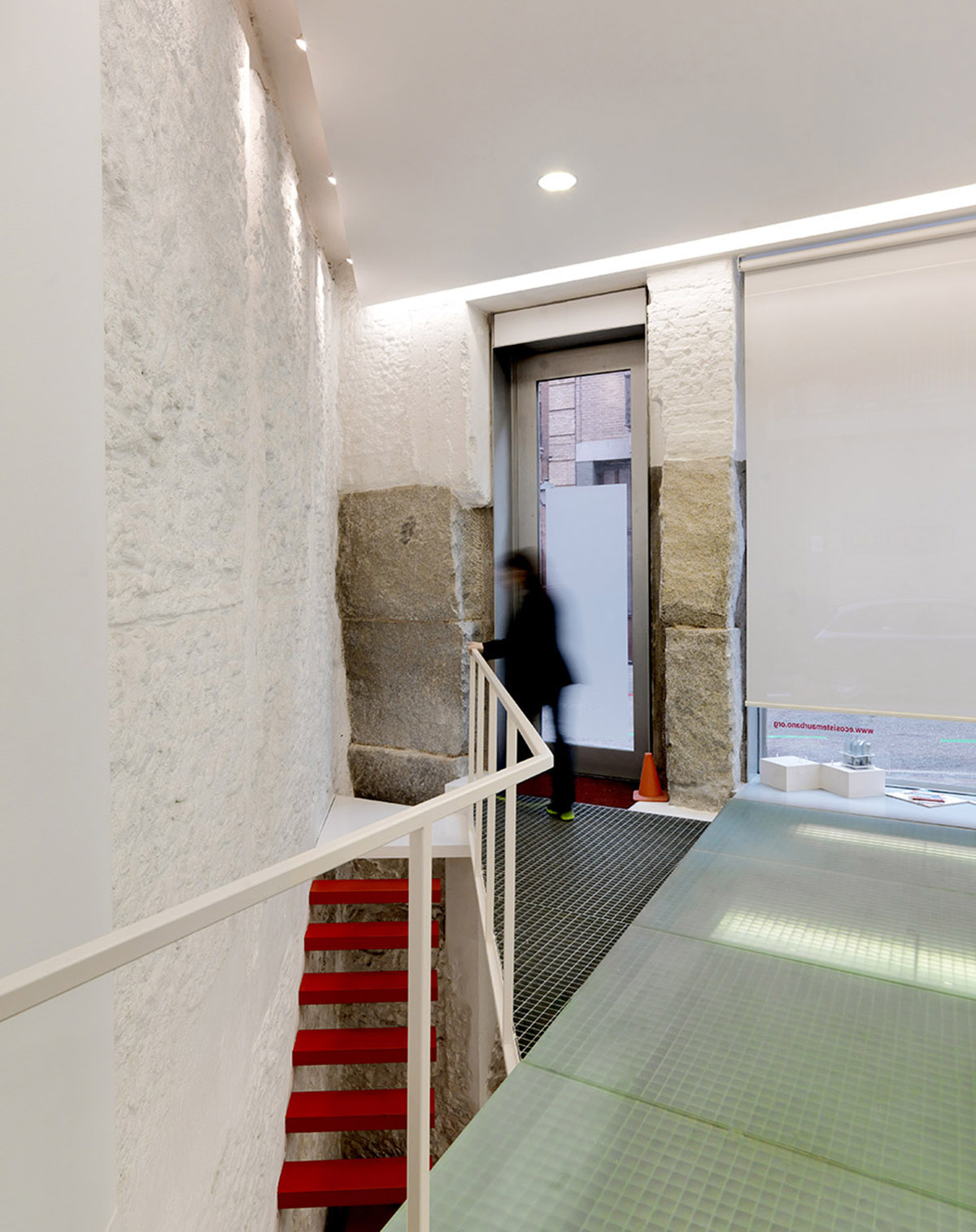 Ecosistema Urbano Office converted from an old storage that presents a very flexible space