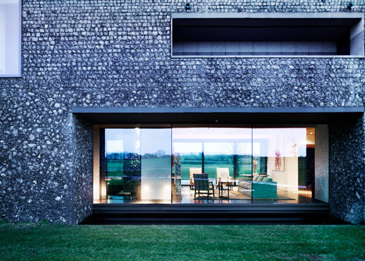 Flint house is an extension of landscape and geological extrusion referring to contemporary stone age