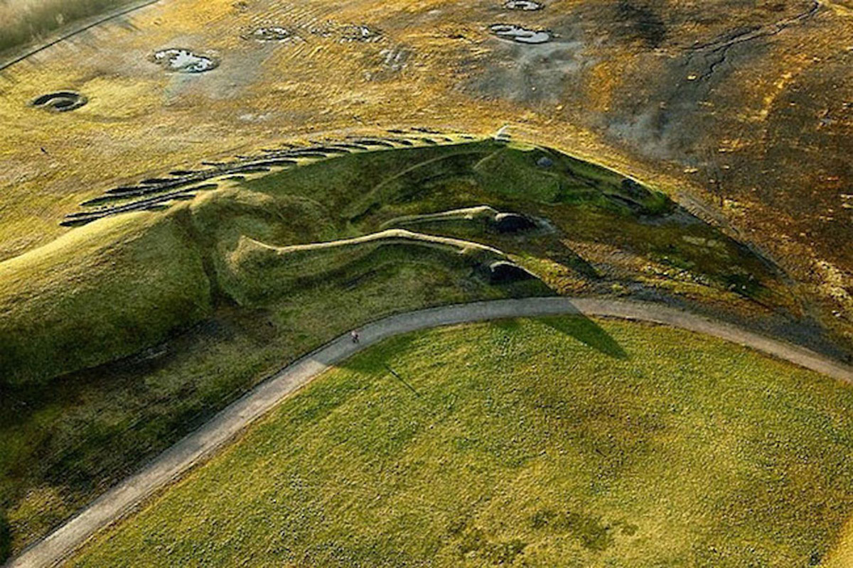 A giant horse earth sculpture integrated with natural landscape in UK