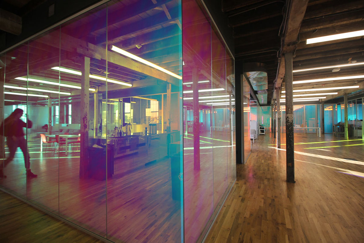 LEESER Architecture transforms an industrial building into office headquarters for Genius Media