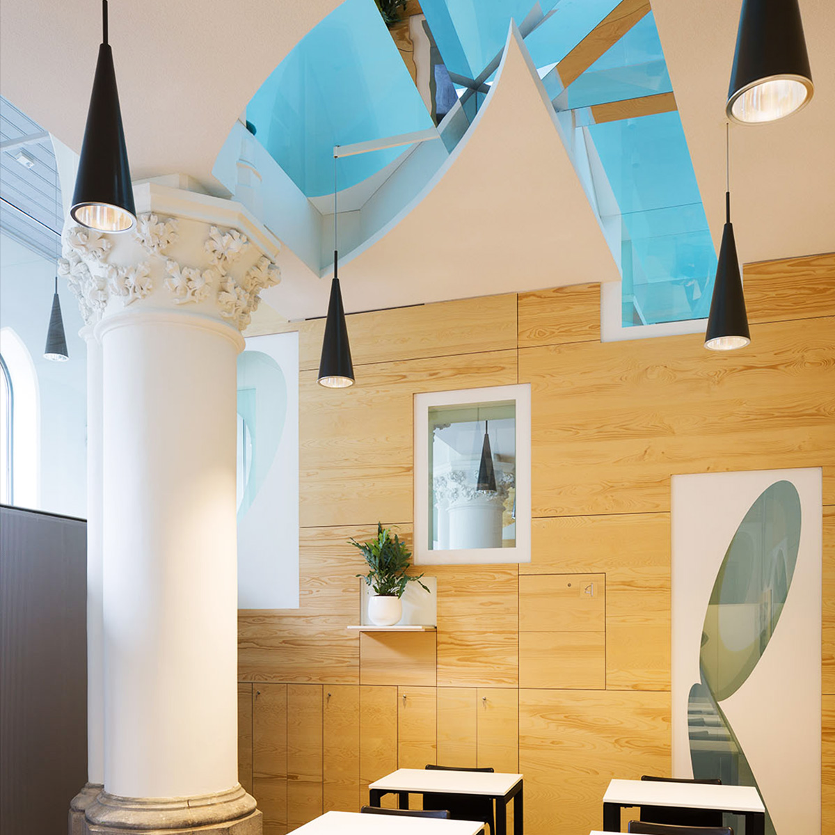 Architect Rob Hootsmans converts old church-style chapel into a new school in Belgium