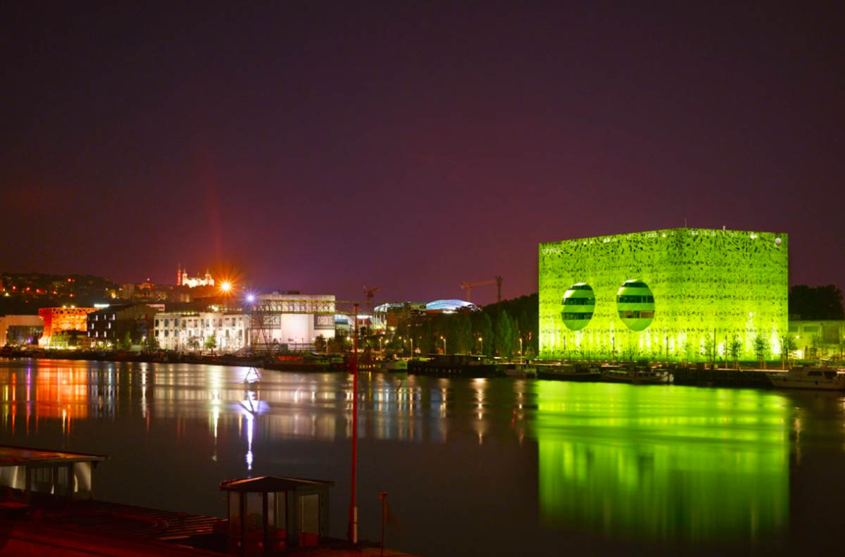 Jacob+Macfarlane’s Euronews HQ becomes a new iconic landmark with its luminous green presence