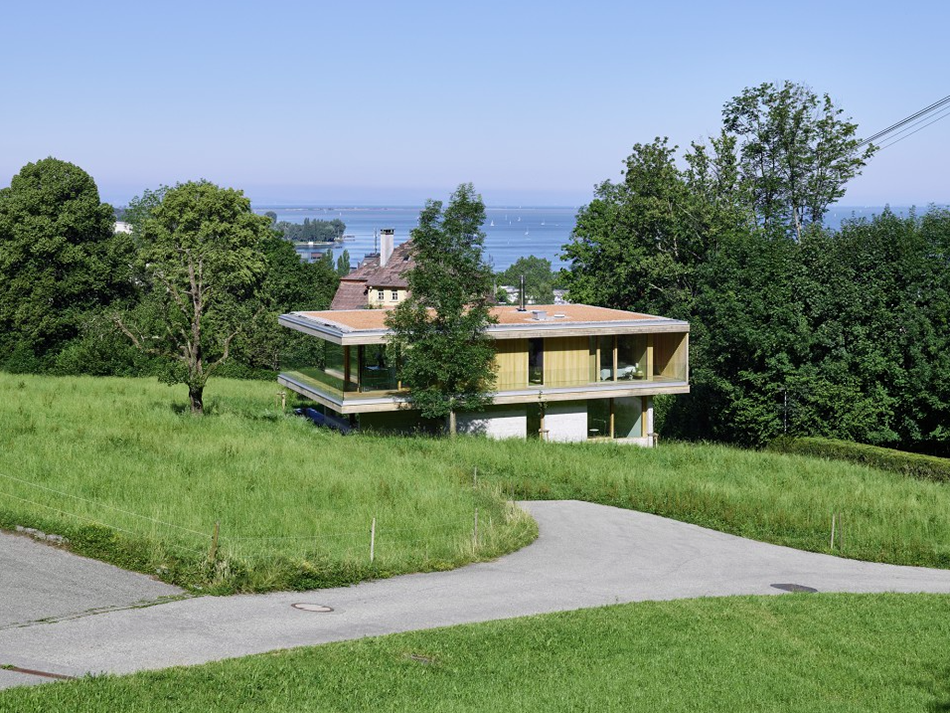 Dietrich | Untertrifaller Architekten completes sandwich-shaped House D on the Bregenz mountain