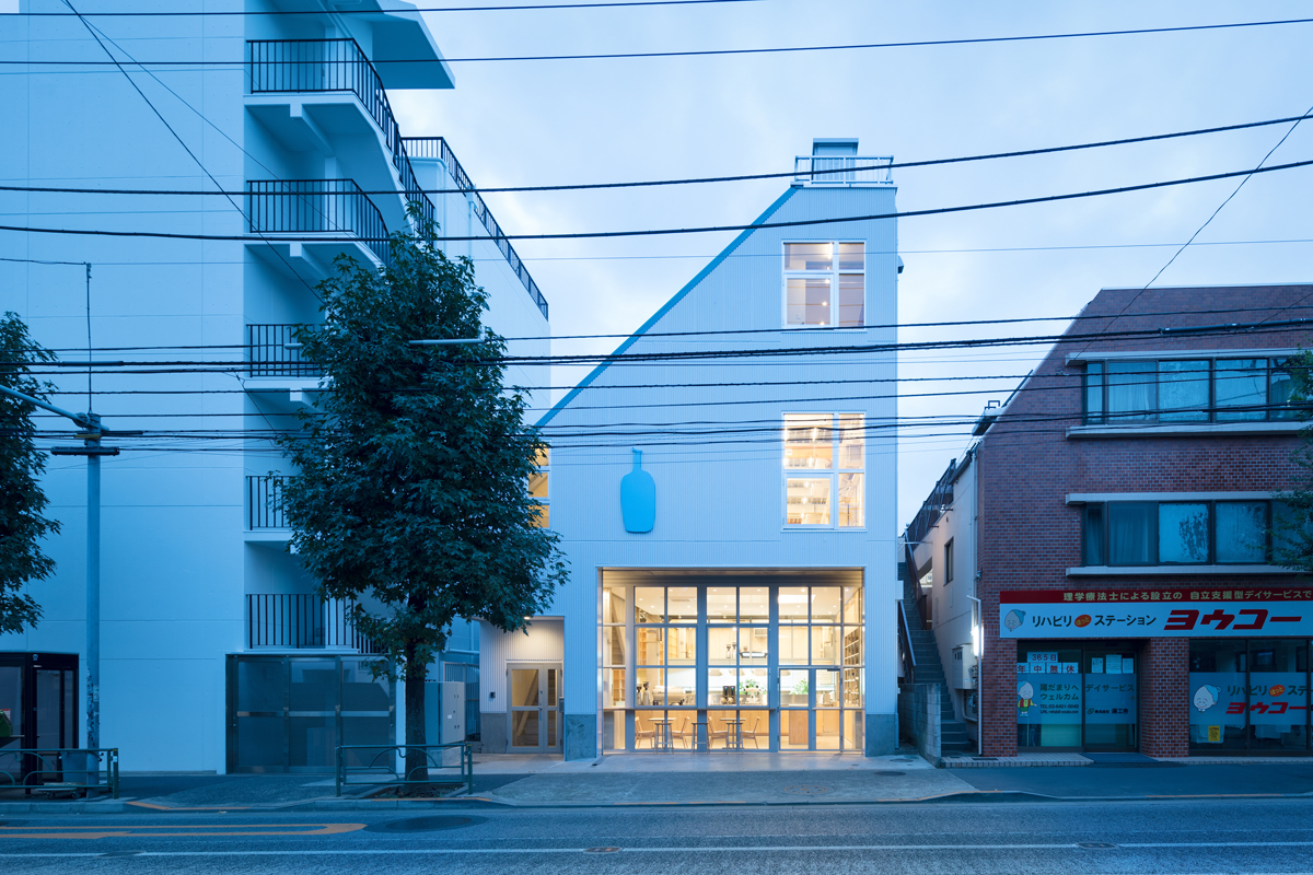Schemata Architects completes Blue Bottle Coffee Nakameguro Cafe in Tokyo with right-angled roof