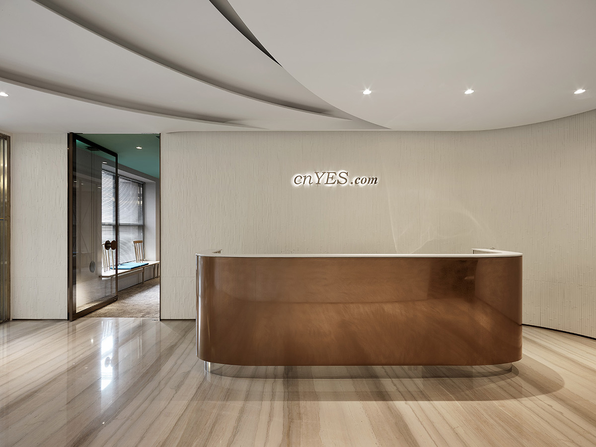 Waterfrom Design completed cnYES Office in Taiwan by using gold and blue colours