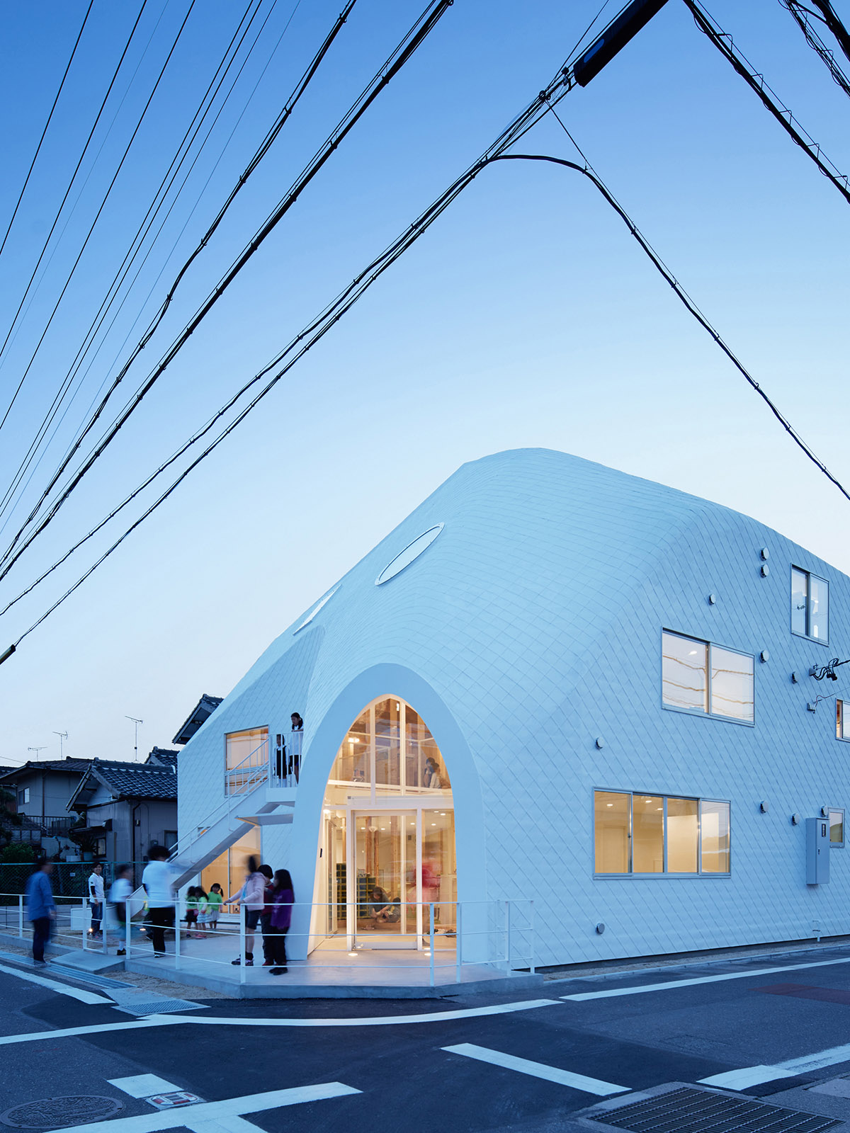 A two-story Japanese house transformed into an amorphous Kindergarten by MAD Architects