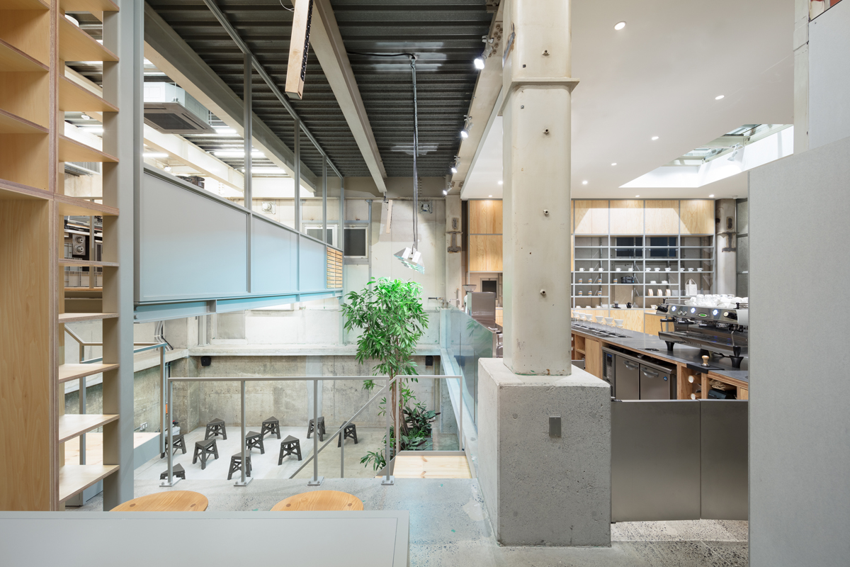 Schemata Architects completes Blue Bottle Coffee Nakameguro Cafe in Tokyo with right-angled roof