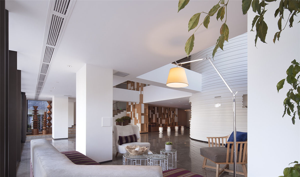 Shenzhen Bay Yacht Club +White Sail Hotel creates an interlocking facade by Shenzhen Rongor Design