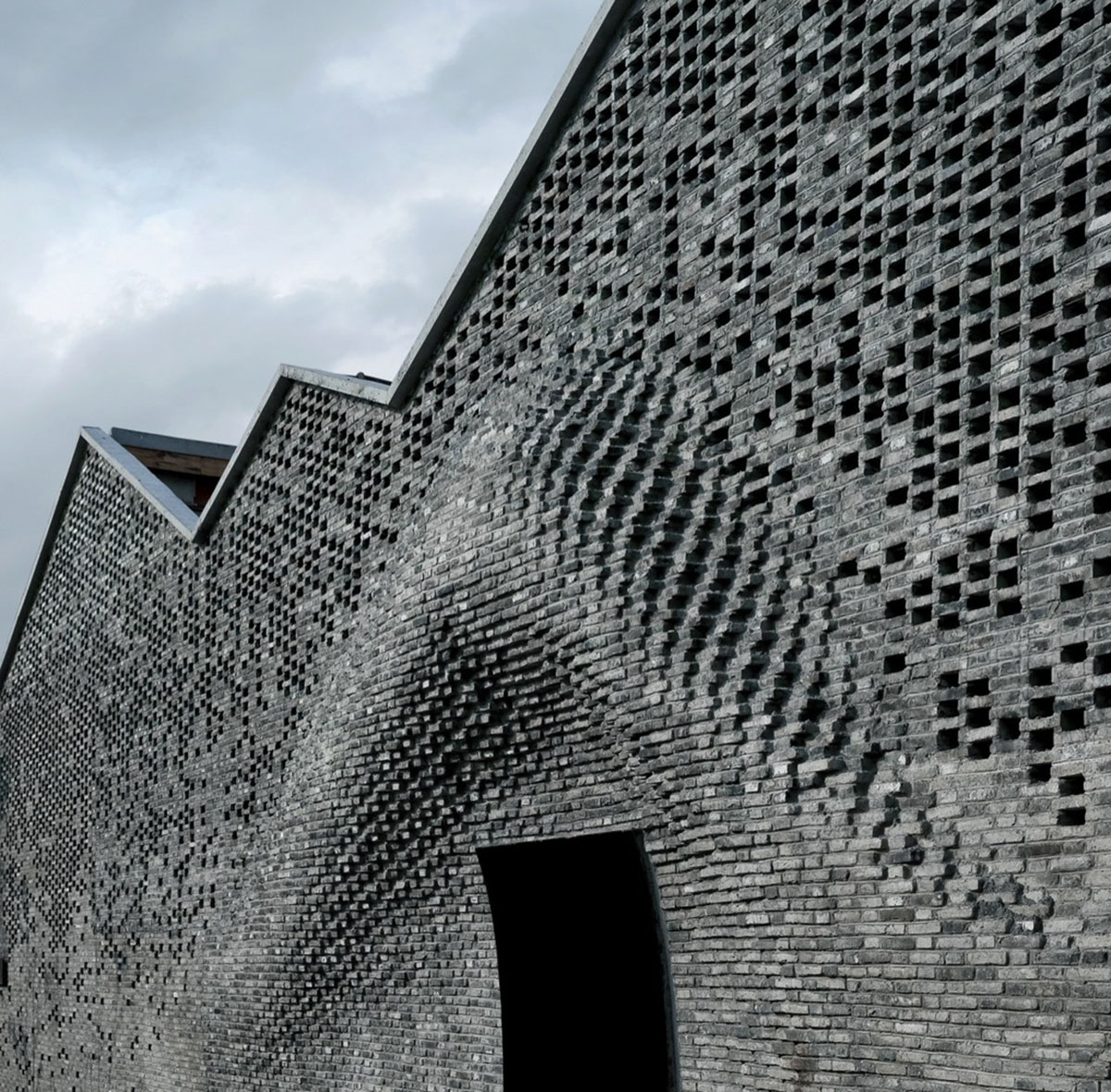 ARCHI-UNION ARCHITECTS USES ROBOTIC MASONRY FABRICATION TECHNIQUE TO THE FACADE OF CHI SHE GALLERY