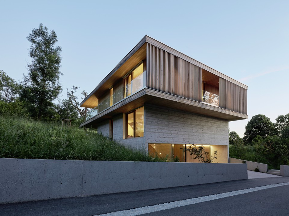 Dietrich | Untertrifaller Architekten completes sandwich-shaped House D ...