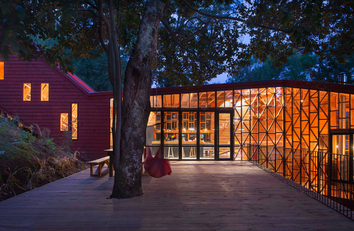 Sebastian Irarrazaval completes snake-shaped 2Y House in Chile’s wild forests