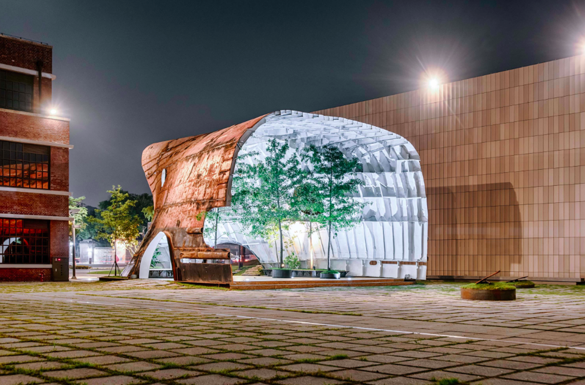 This upside down massive metal pavilion is made of recycled steel parts from an old ship by Shinslab