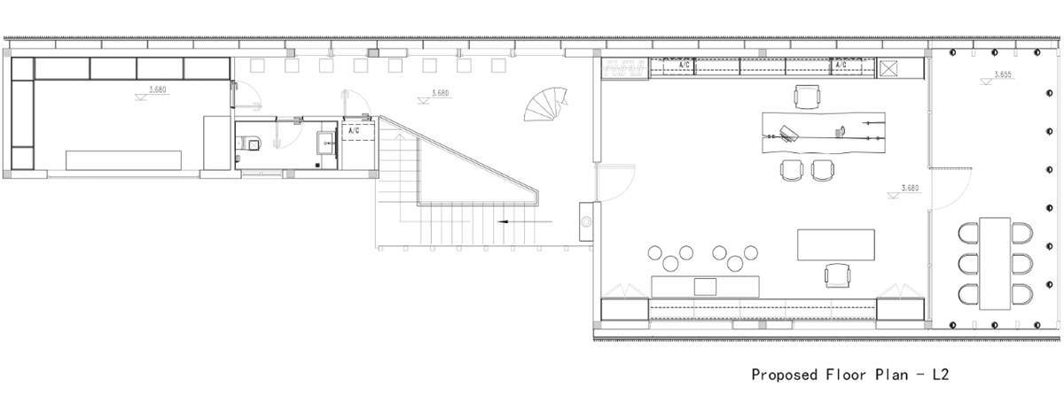 A red cedar grill placed on mottled worn walls of Ceramic House to preserve authenticity