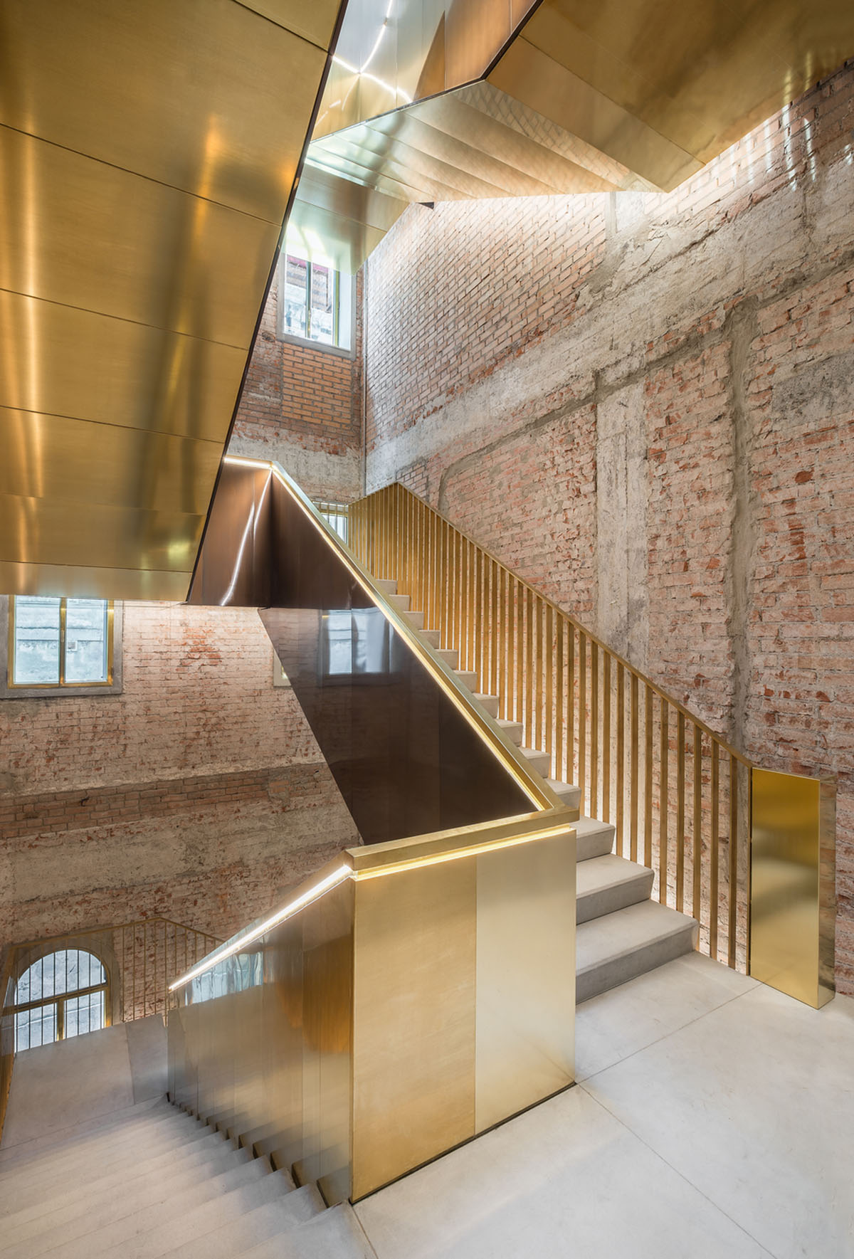 OMA converted Venice’s historic building into a new department store supporting new functions