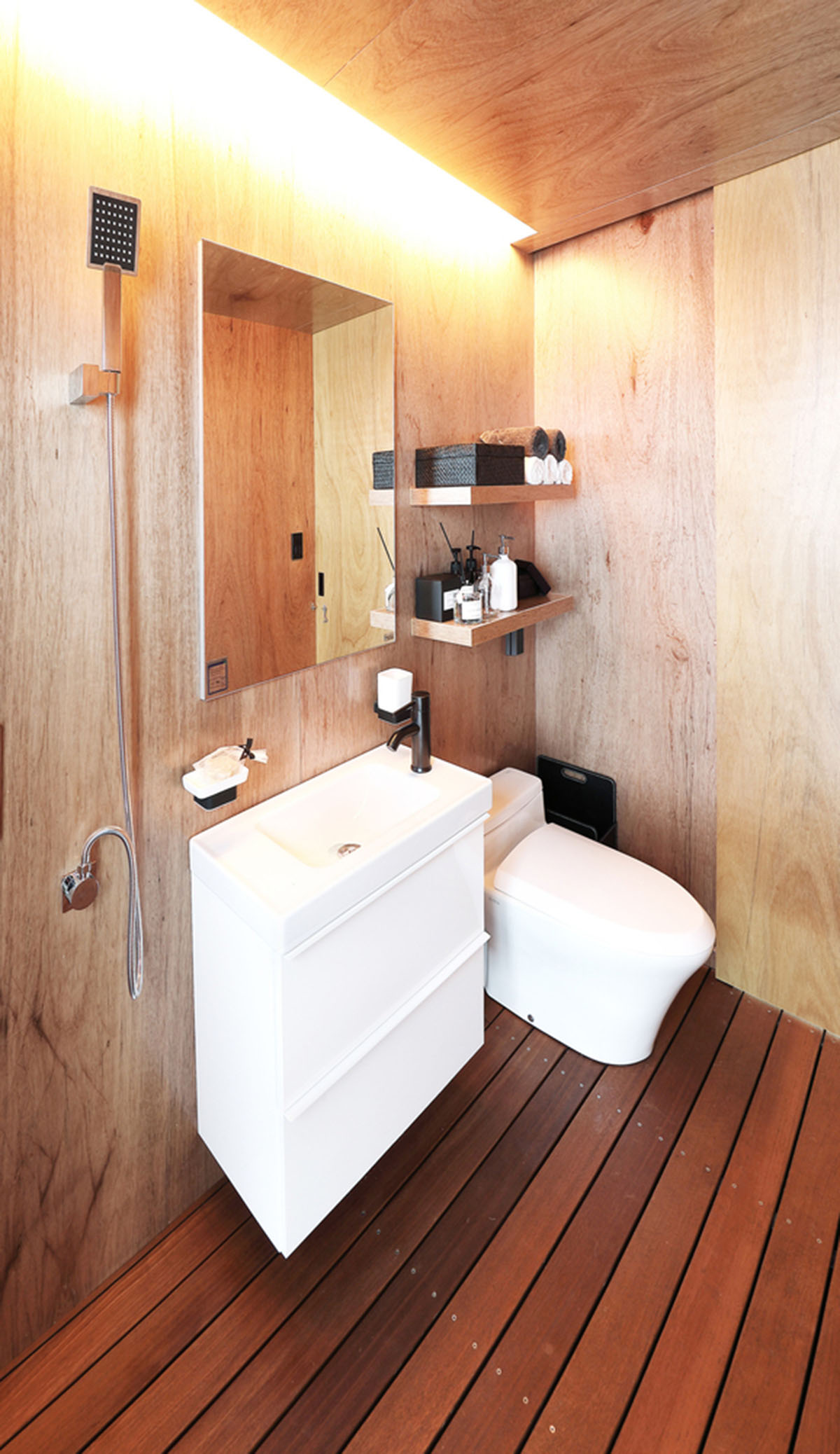 A Tiny House Of Slow Town by The Plus Partners+DNC Architects creates a minimum footprint