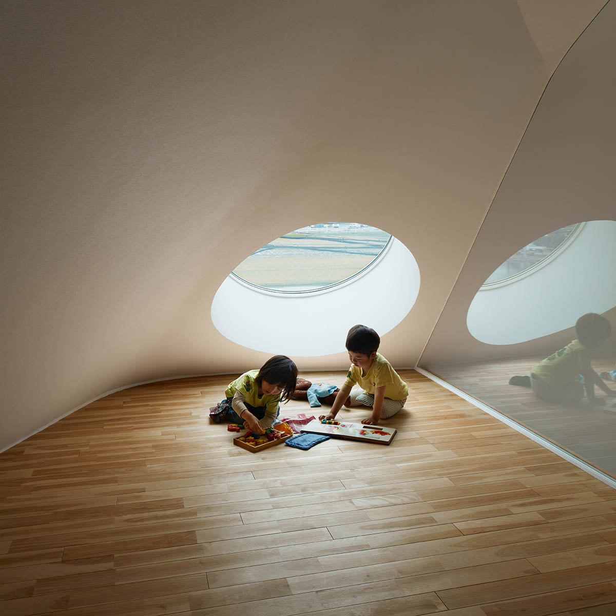 A two-story Japanese house transformed into an amorphous Kindergarten by MAD Architects