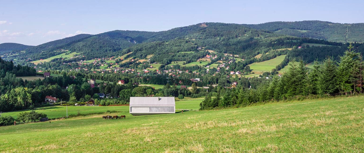 Robert Konieczny&rsquo;s twisted ARK House touches the ground only in one corner on the Polish hill