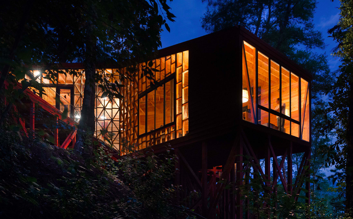 Sebastian Irarrazaval completes snake-shaped 2Y House in Chile’s wild forests