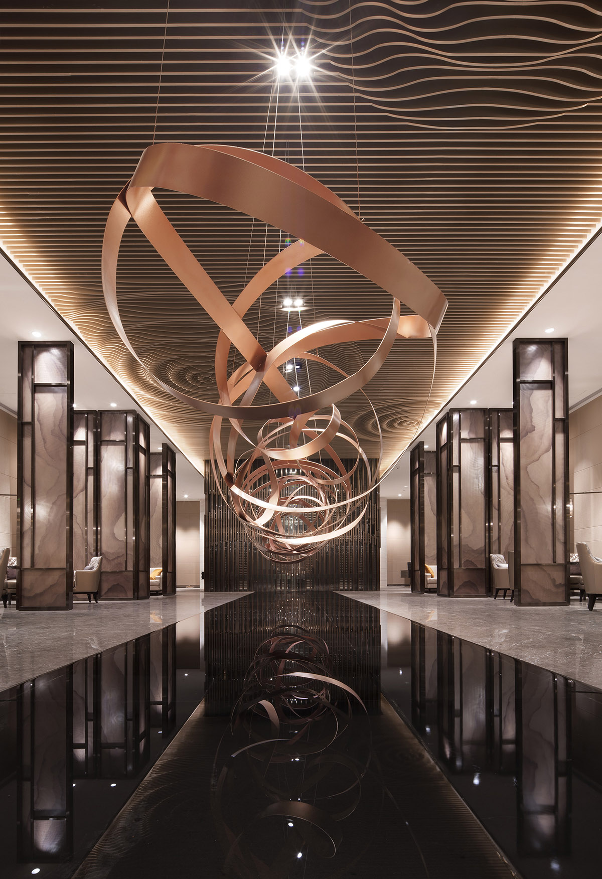 Rongor Design elaborates interior of Huafa & City Hub Wuhan Sales Center with ripplings of water