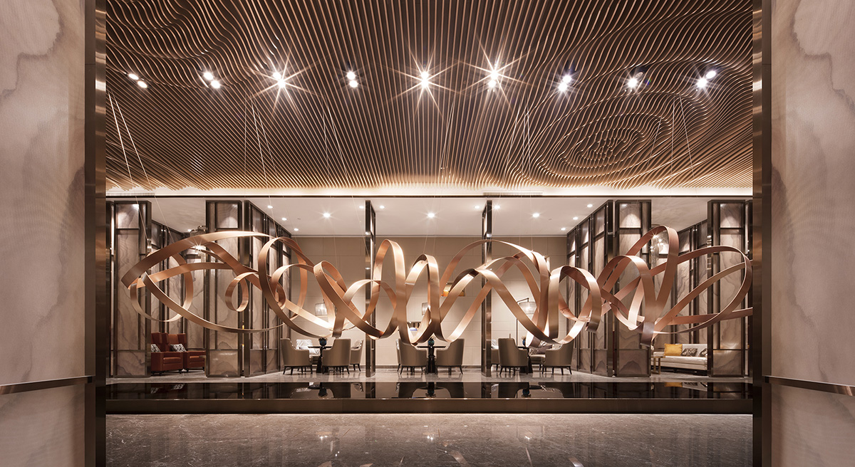 Rongor Design elaborates interior of Huafa & City Hub Wuhan Sales Center with ripplings of water