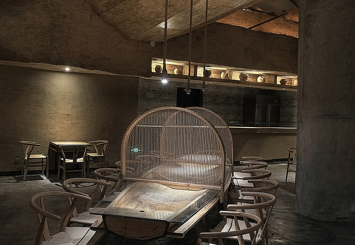 Designer Xu Xu-Jun hangs plenty of wooden-boats from the ceiling of Pu Zao Restaurant in China