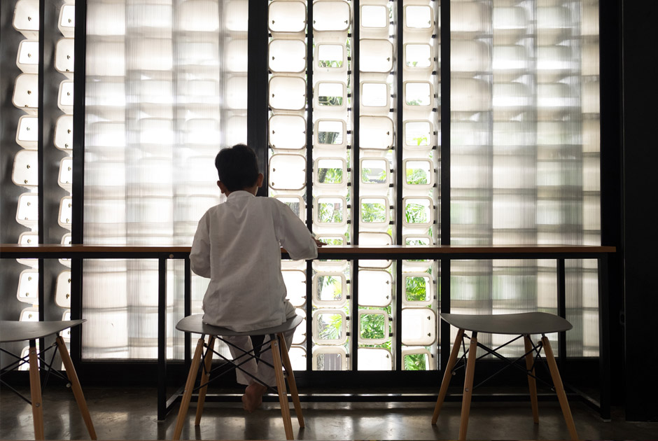 This Microlibrary was made out of 2,000 recycled ice cream buckets in Indonesia