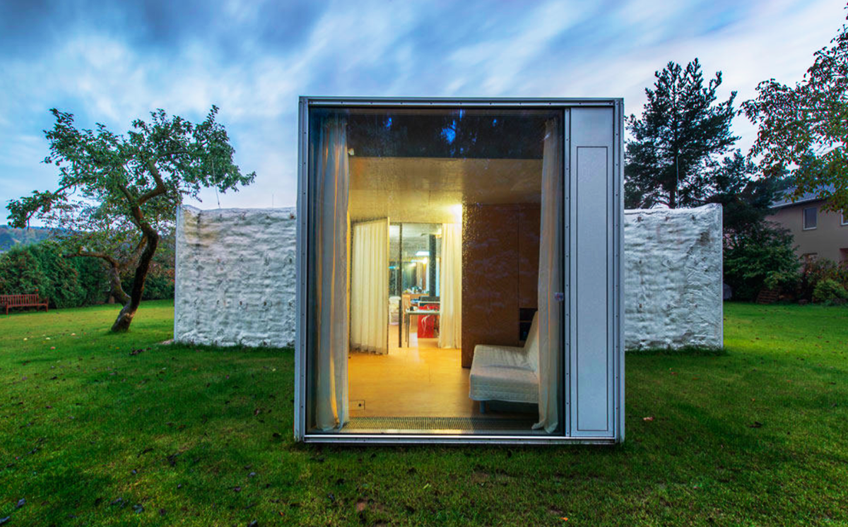 This branched tree-like house creates a chameleon effect in its surrounding