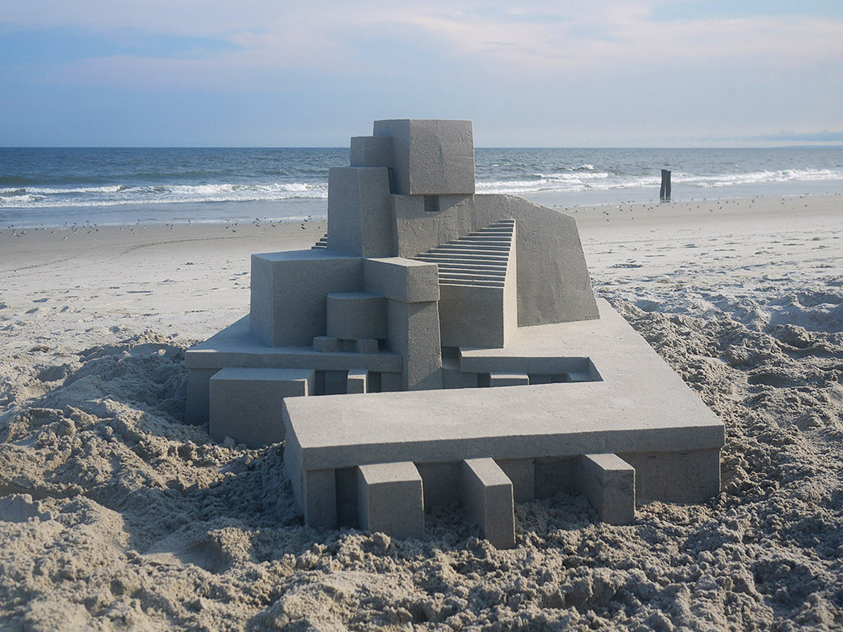 Sculptor Calvin Seibert reflects brutalist architecture with geometric sandcastles on Rockaway Beach