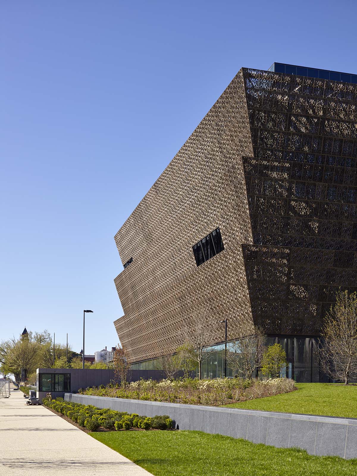David Adjaye’s NMAAHC wrapped by ornamental bronze lattice opens next week in Washington