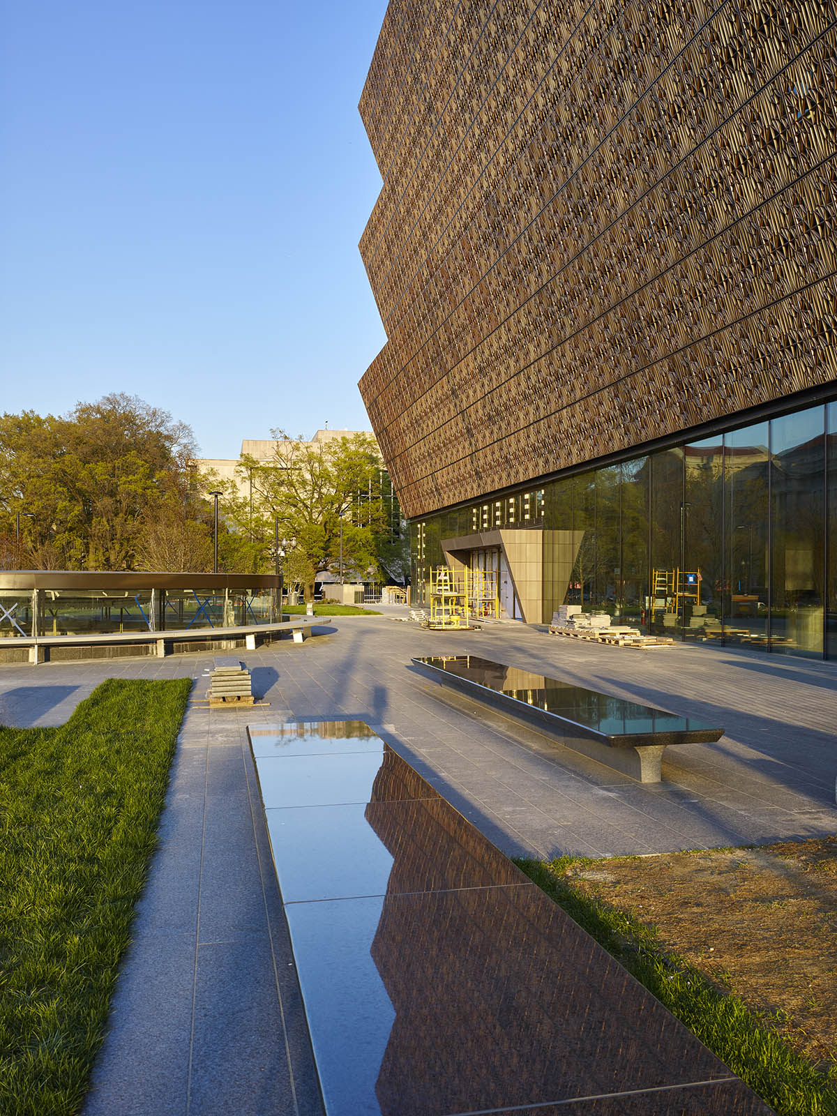 David Adjaye’s NMAAHC wrapped by ornamental bronze lattice opens next week in Washington