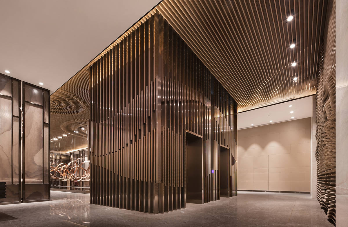 Rongor Design elaborates interior of Huafa & City Hub Wuhan Sales Center with ripplings of water