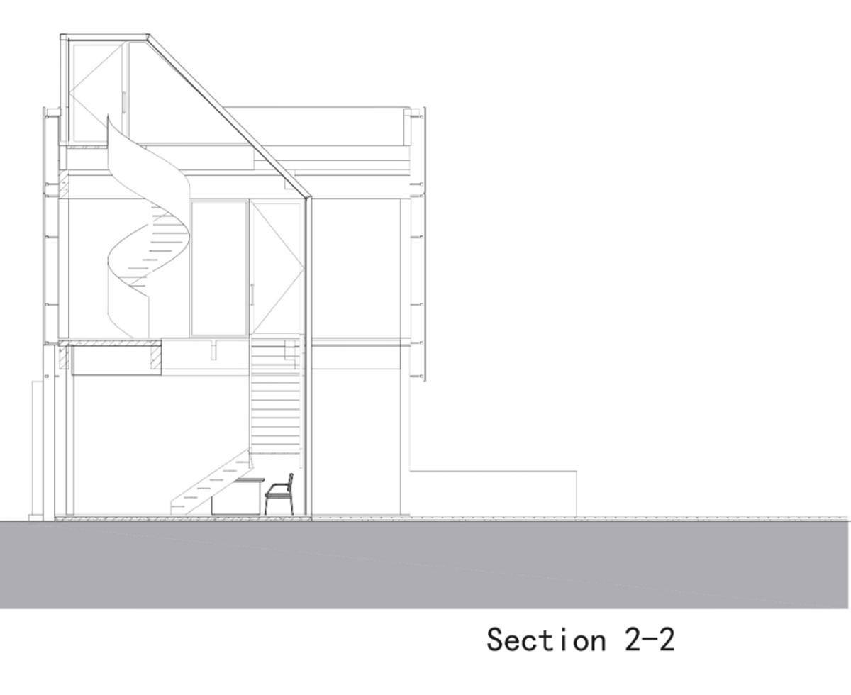 A red cedar grill placed on mottled worn walls of Ceramic House to preserve authenticity