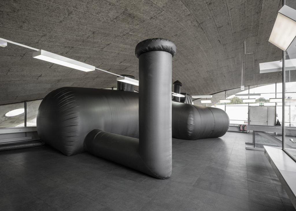 Bureau A designed an inflatable black shelter for a temporary nightclub made of PVC membrane