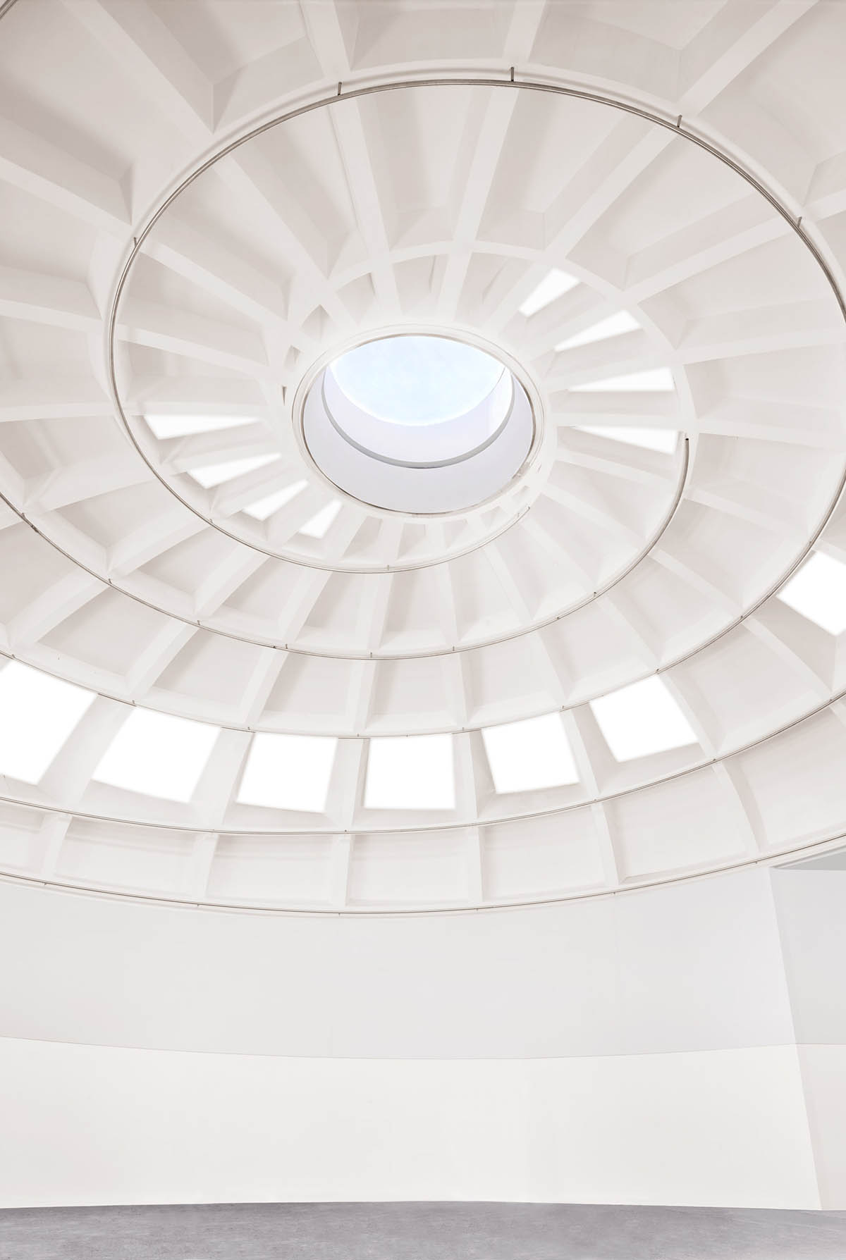 OMA&rsquo;s cylindrical Faena District revives Miami Beach with white cast concrete and carved facade