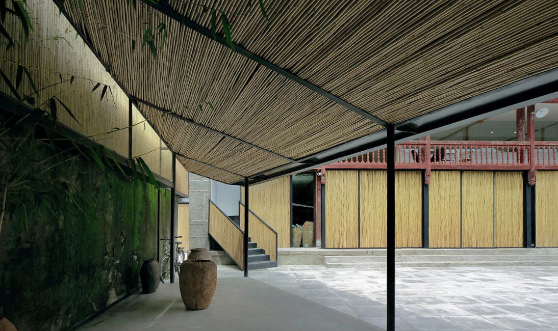 Zhaoyang Architects wraps Chaimiduo Farm Restaurant in Dali with bamboo to emphasize its volume