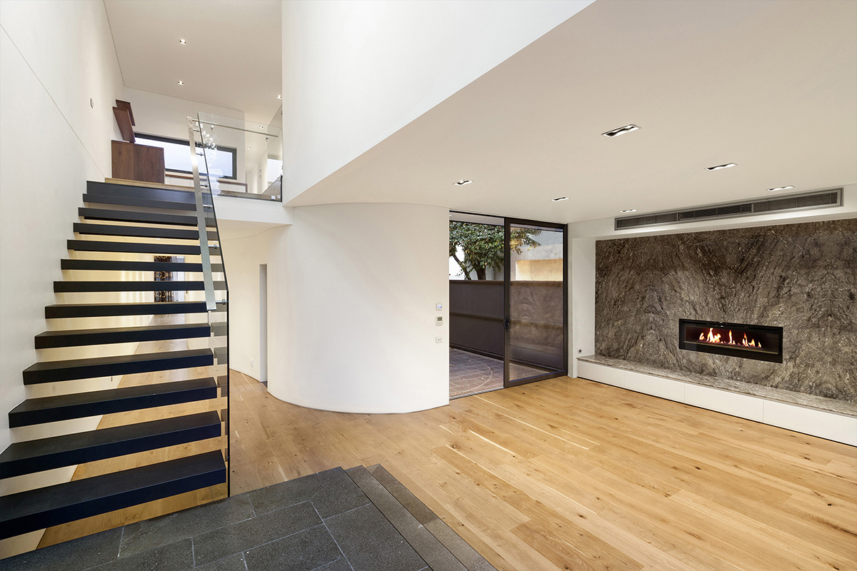 KUD Architects makes a strip window for the lounge area of South Yarra House in Australia