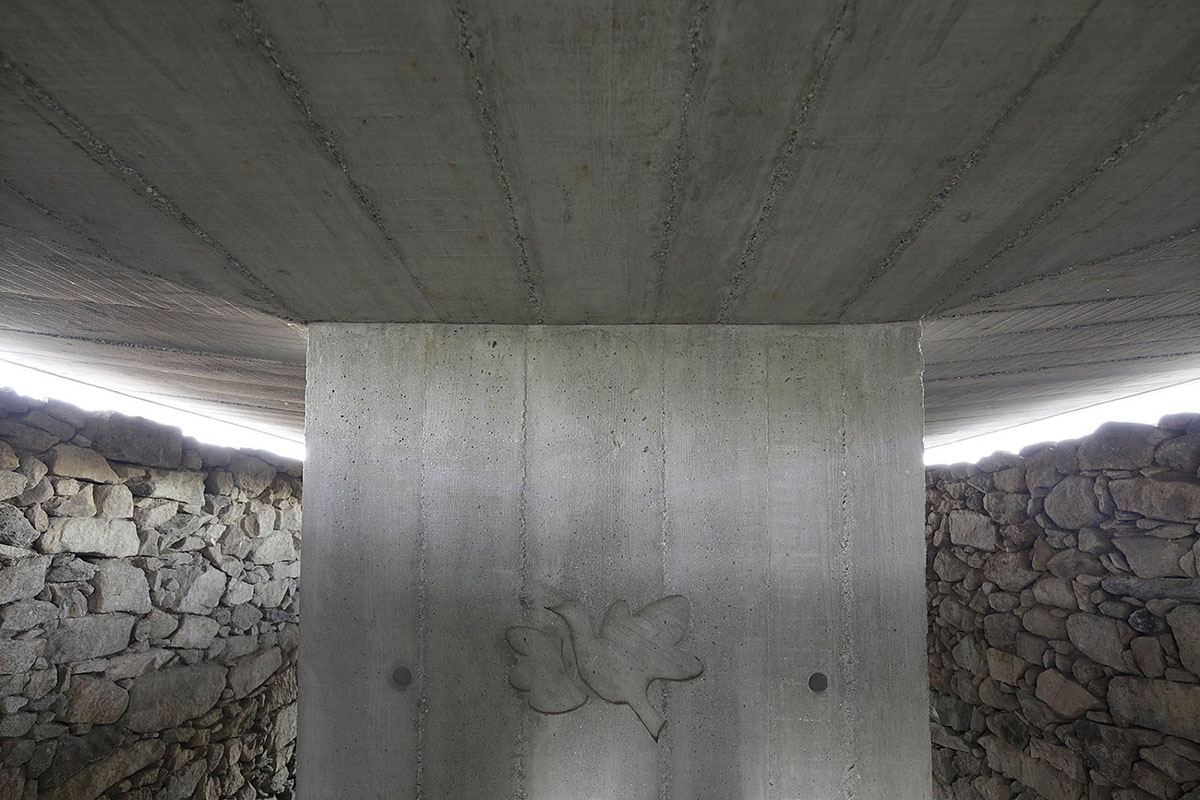 AZO Sequeira Arquitectos Associados converts old Dovecote into a minimal concrete house