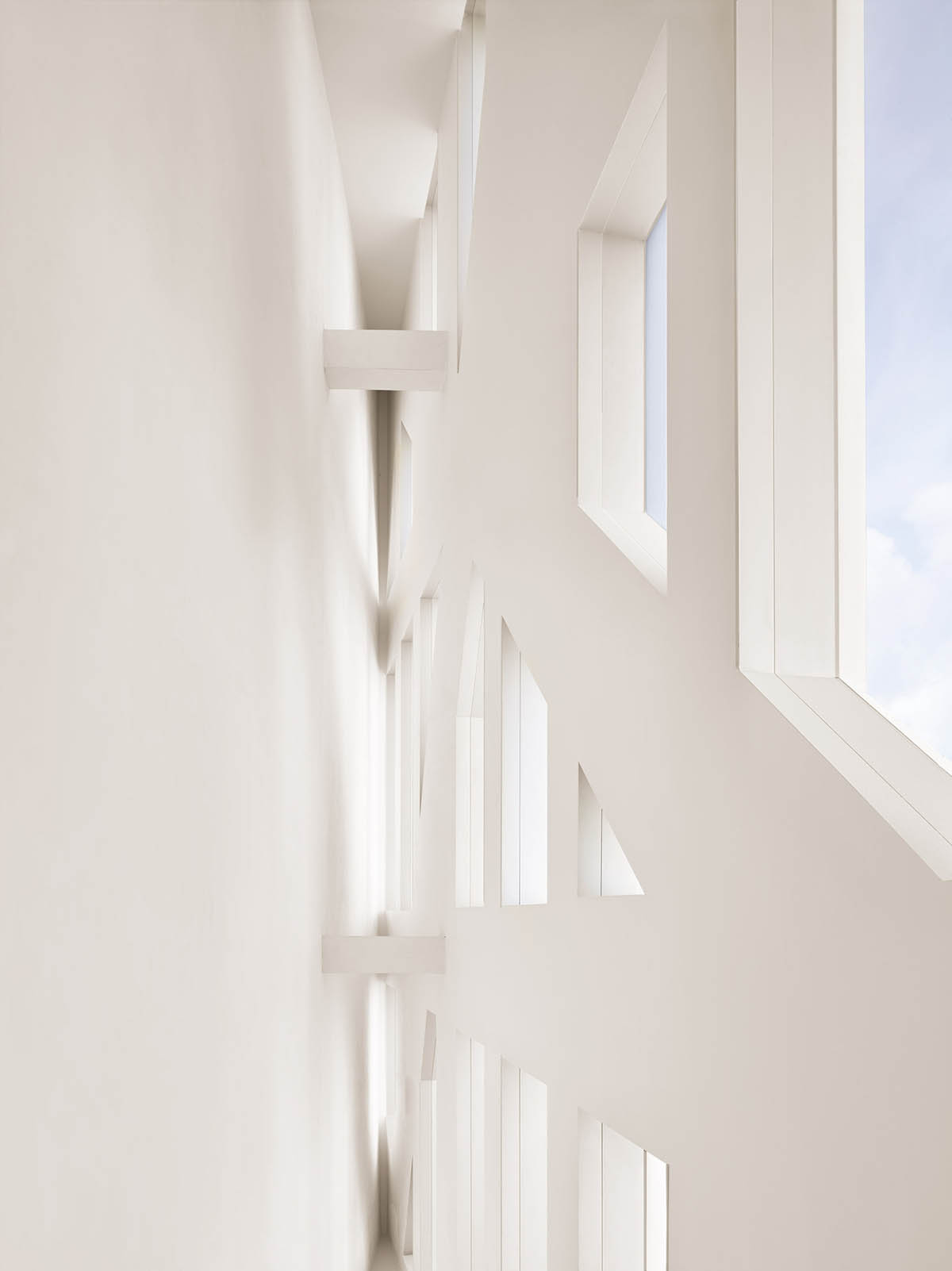 OMA&rsquo;s cylindrical Faena District revives Miami Beach with white cast concrete and carved facade