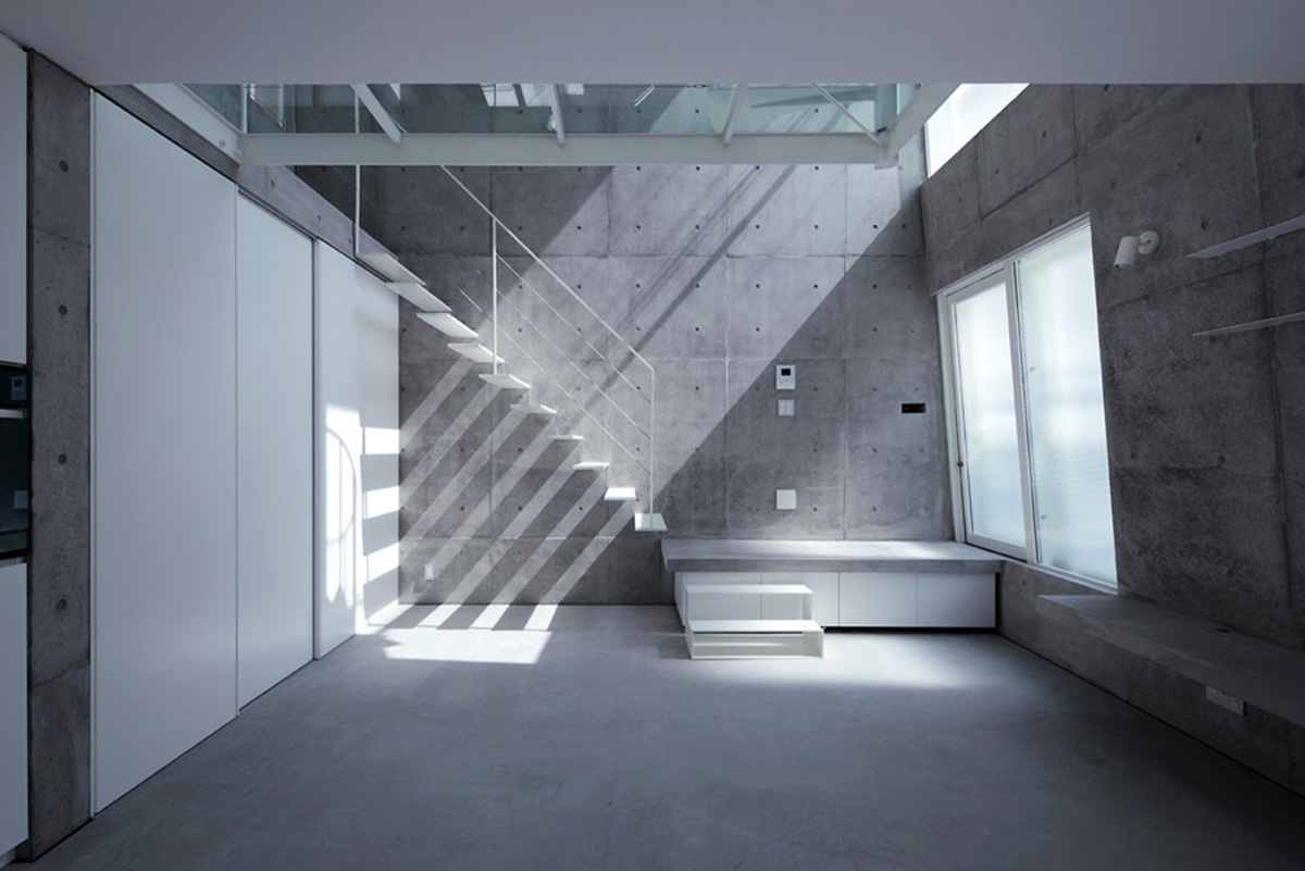 ’Tokyo House’ reflects interior living with a white abstract form emphasizing corner of the street