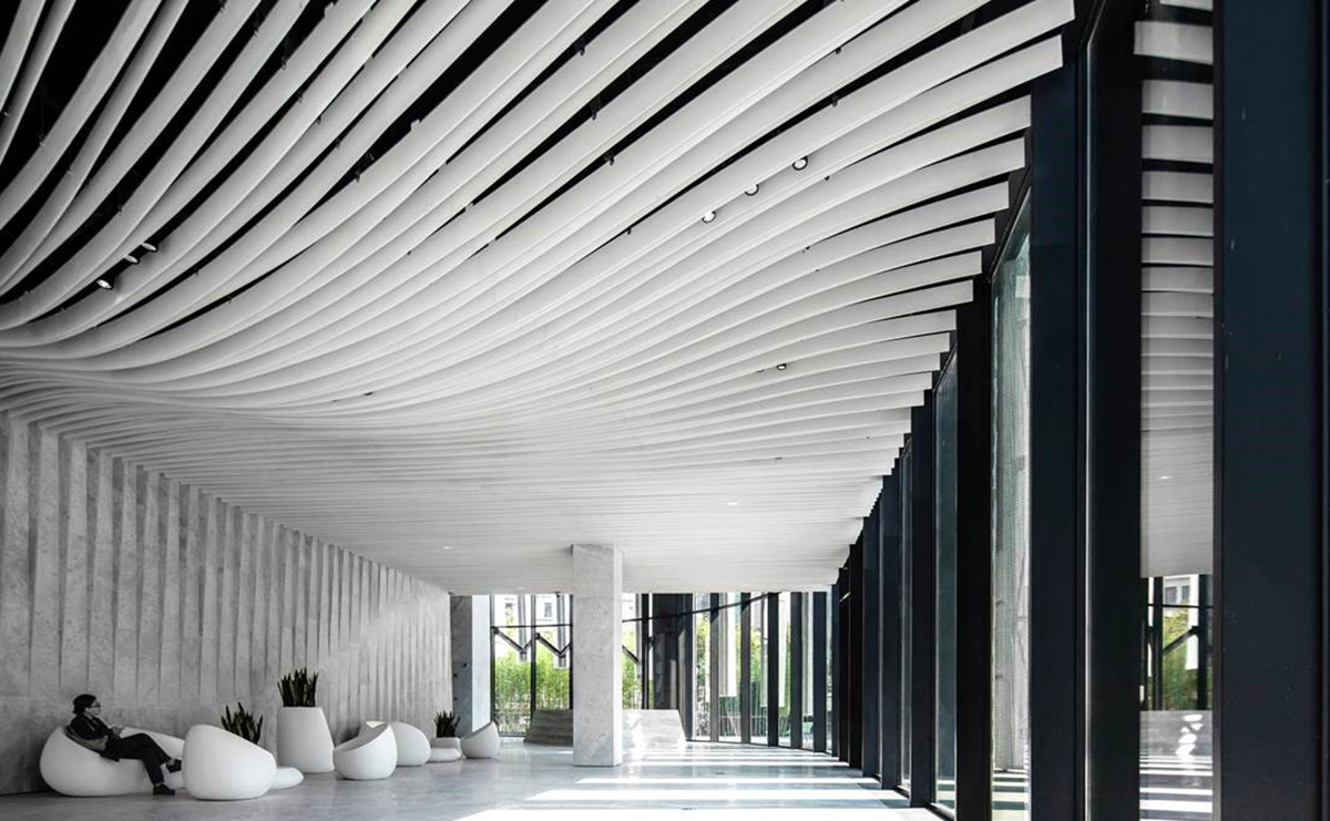 Kengo Kuma and Associates designed a Woven Lace-like office Kengo Kuma and Associates designed a Woven Lace-like office