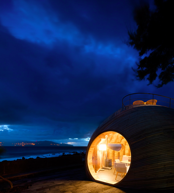 A Cella Bar organically attached to the existing building designed by FCC Arquitectura+Paulo Lobo