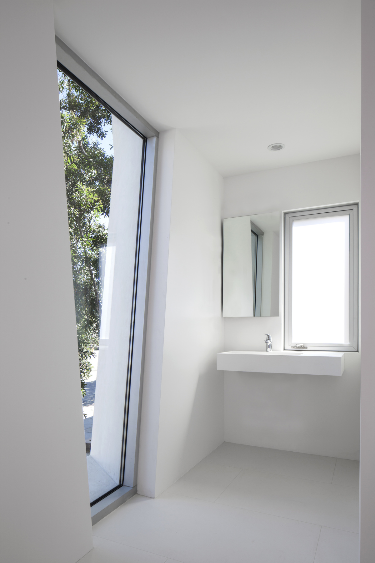 Tighe Architecture elaborates Garrison Residence with articulated openings to frame ocean views